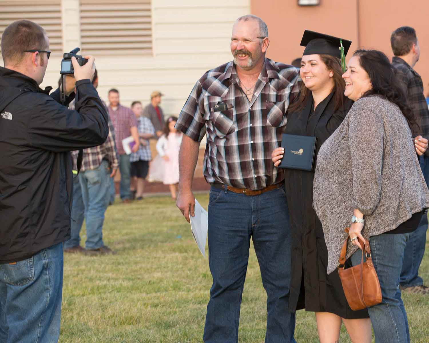 Graduation student with family